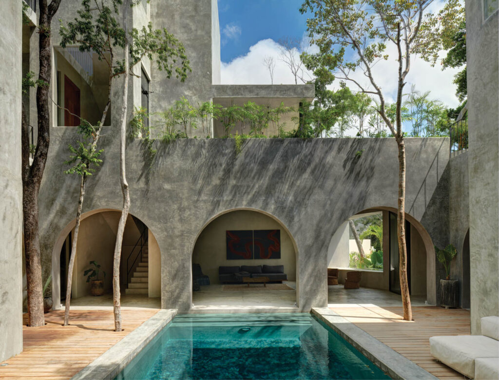 An outdoor pool surrounded by a Brazilian teak deck