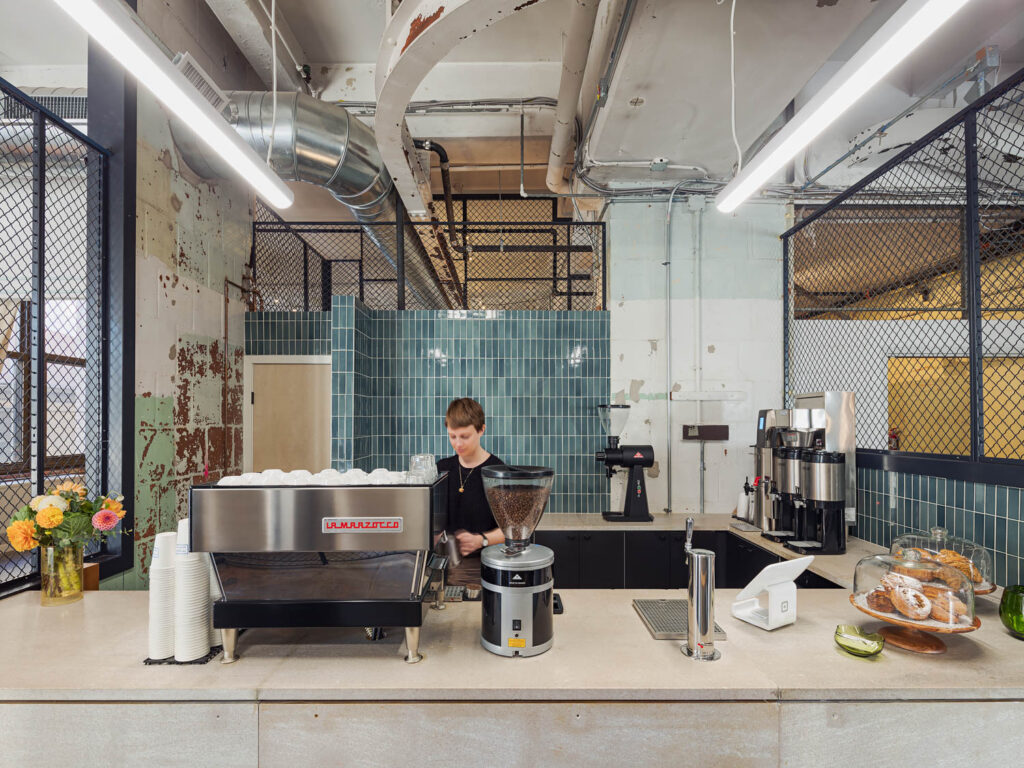 A back wall of tiles from Heath Ceramic define the space.