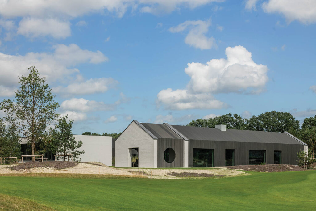 The exterior of the Brabant office, a barnlike composition of volumes.